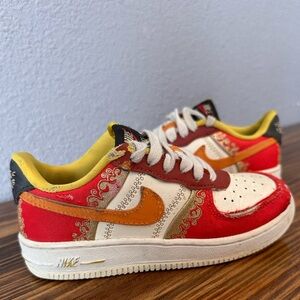 Nike Kids Vibrant Red and Yellow Sneakers